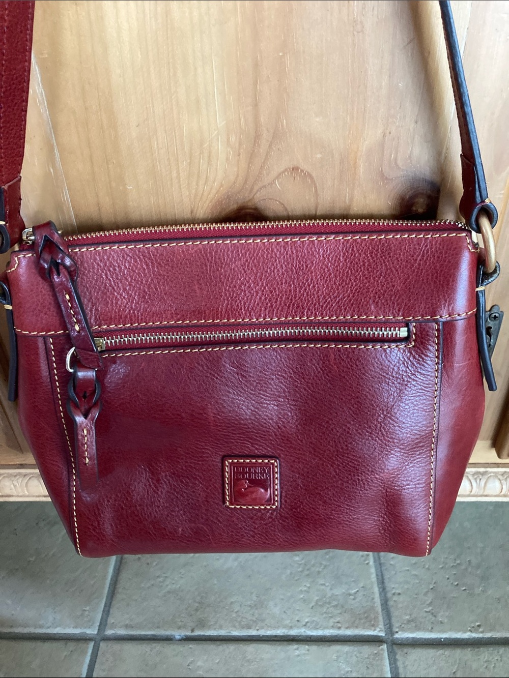 Dooney & Bourke Burgundy Leather Crossbody with Brass Hardware - Picture 2 of 14
